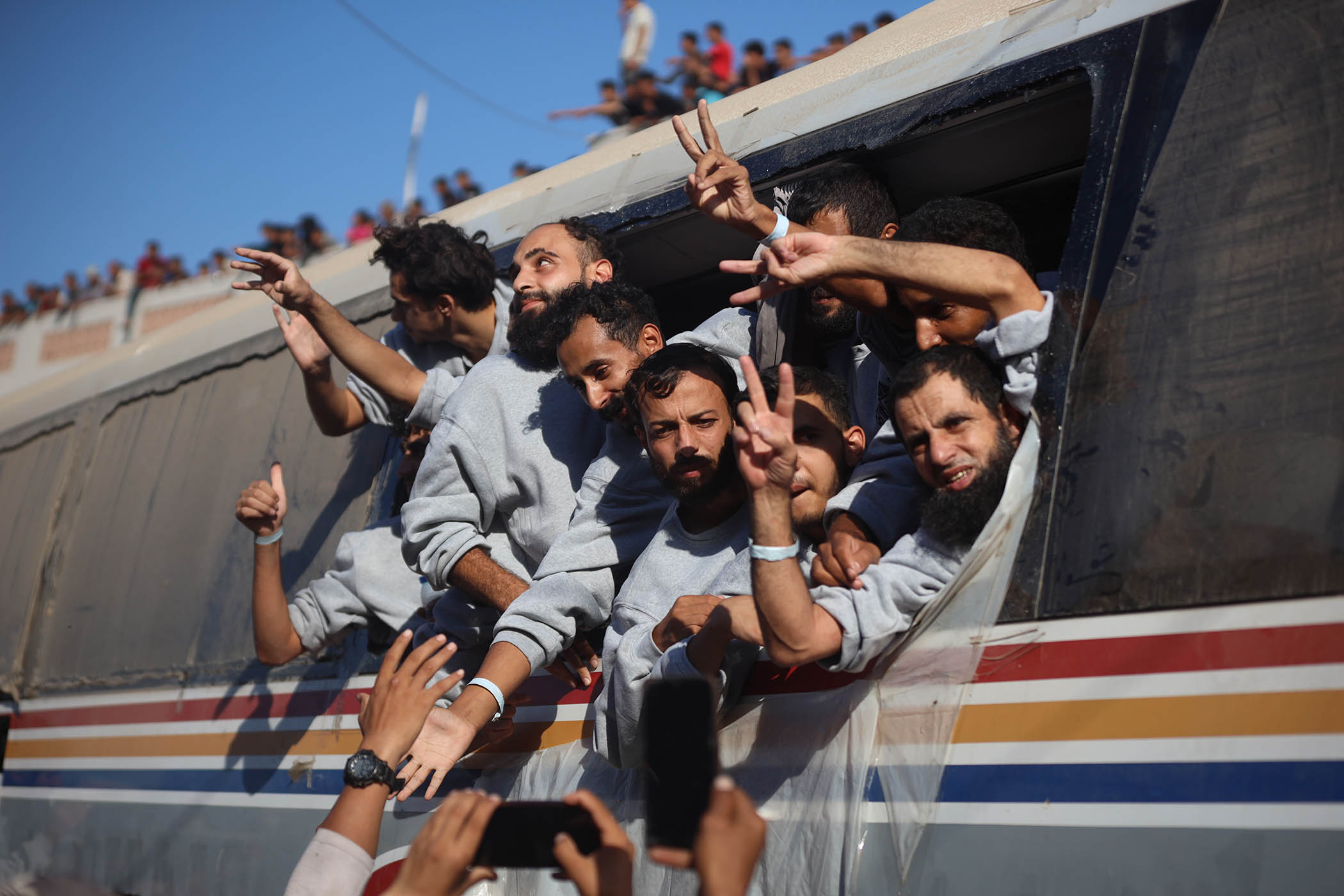 Tears, relief, fresh bruises – Palestinian prisoners return